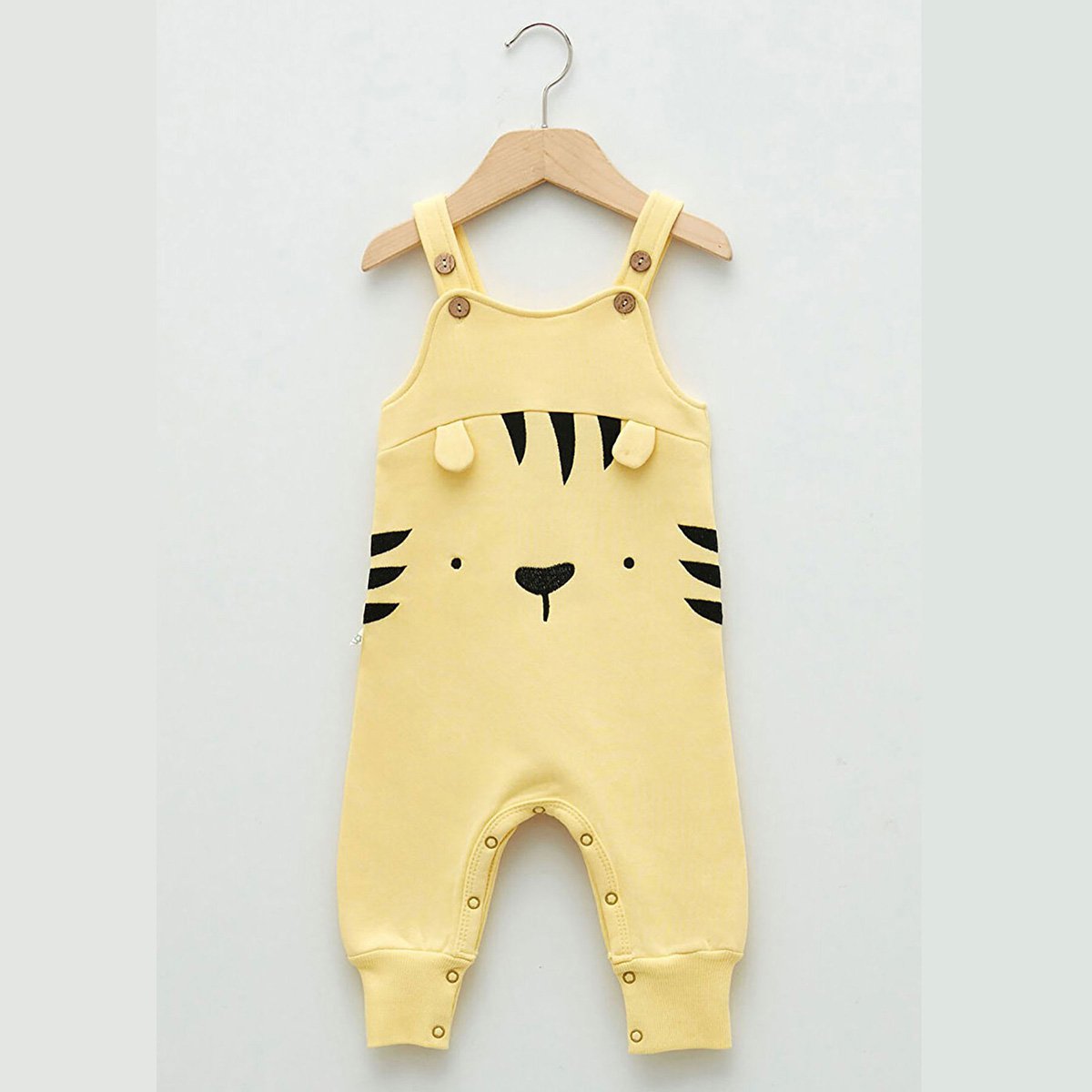 Biologische baby-overall met borduursel van zacht katoen