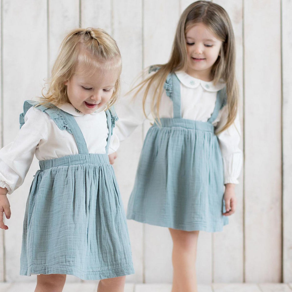 Biologische mousseline babyjurk met franjes – aqua