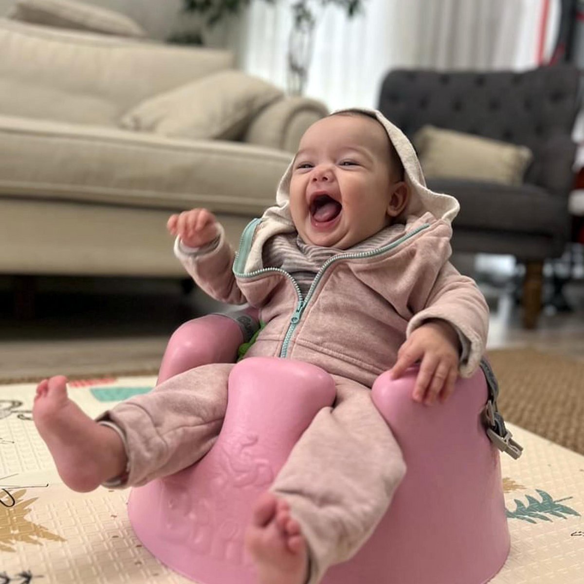 Biologisch babyjack met capuchon – roze melange