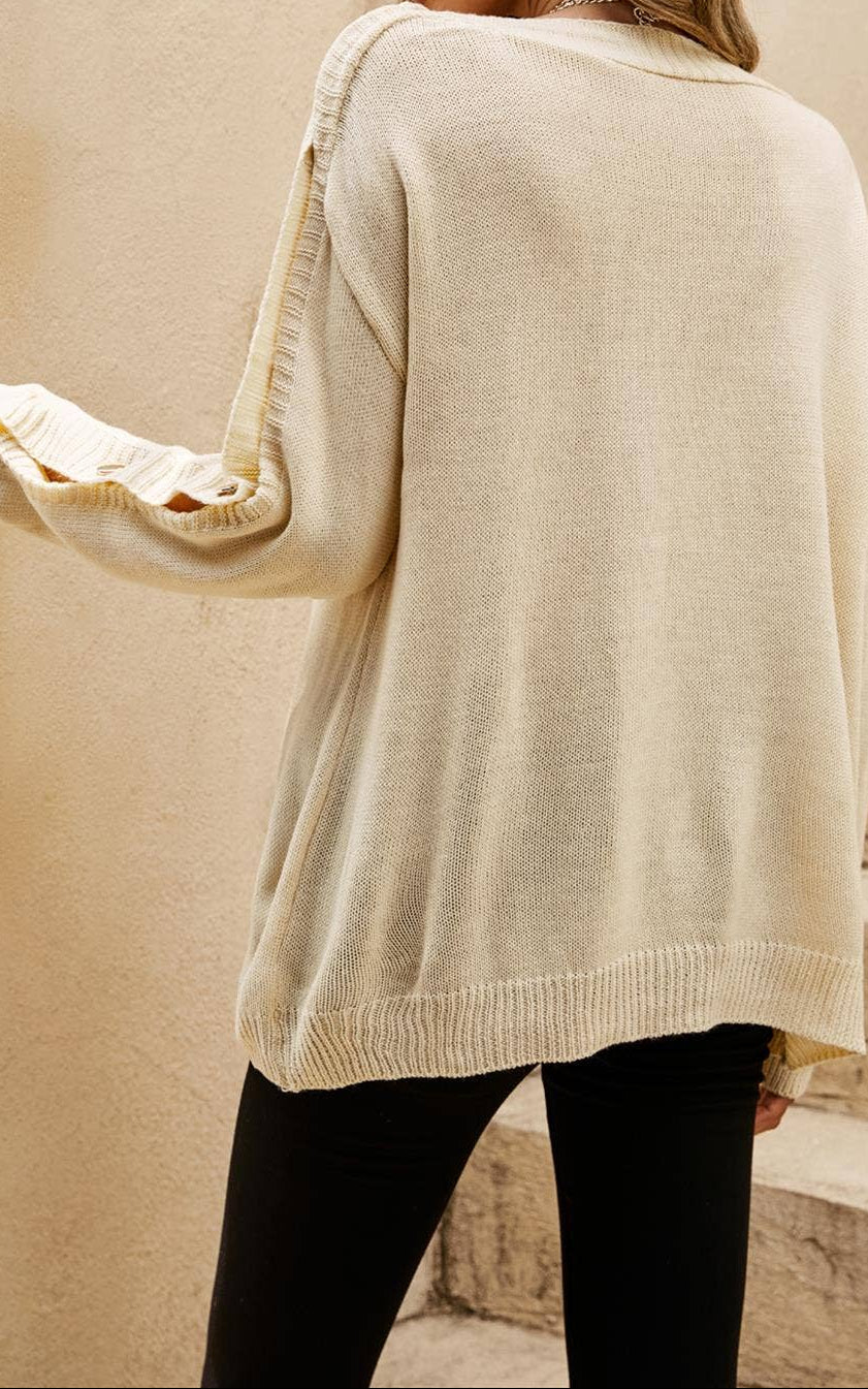 Stijlvolle gebreide damespullover met knoopdetails – Beige