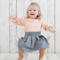 Biologische Mousseline Bodyblouse met Peter Pan-kraag – Zalm
