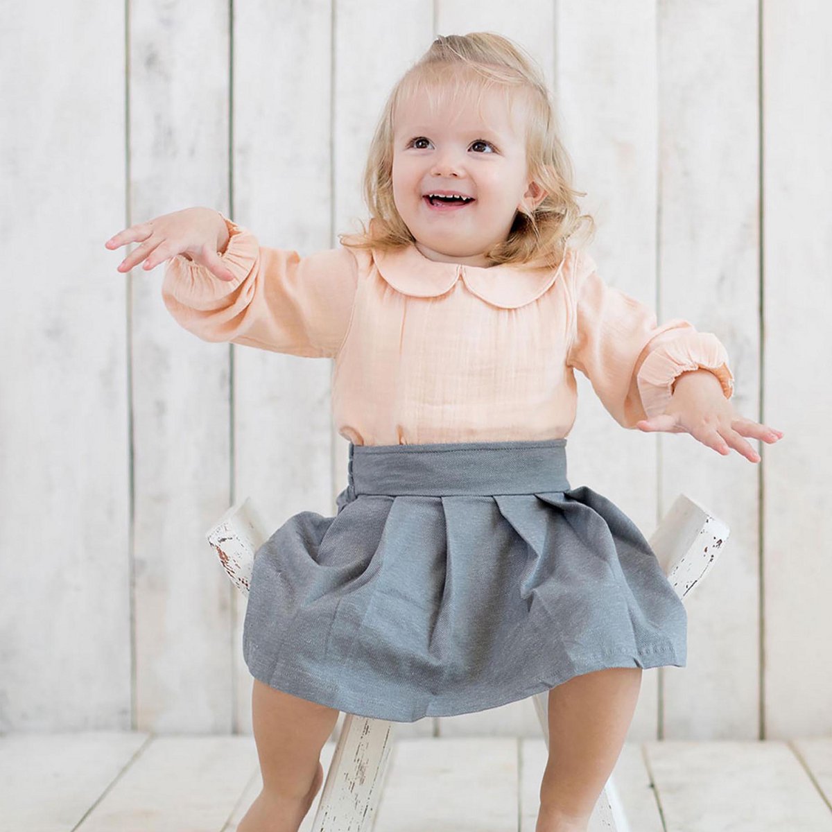 Biologische Mousseline Bodyblouse met Peter Pan-kraag – Zalm