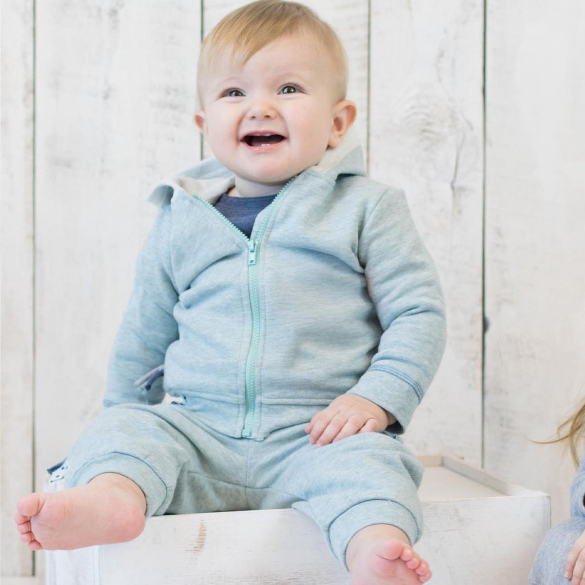 Biologisch babyjack met capuchon – aqua melange