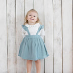 Biologische mousseline babyjurk met franjes – aqua